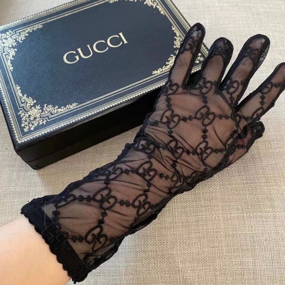 GU* embroidery resembles mesh gloves