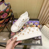 L   printed white shoes