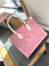 An elegant bag in L**** embossed leather